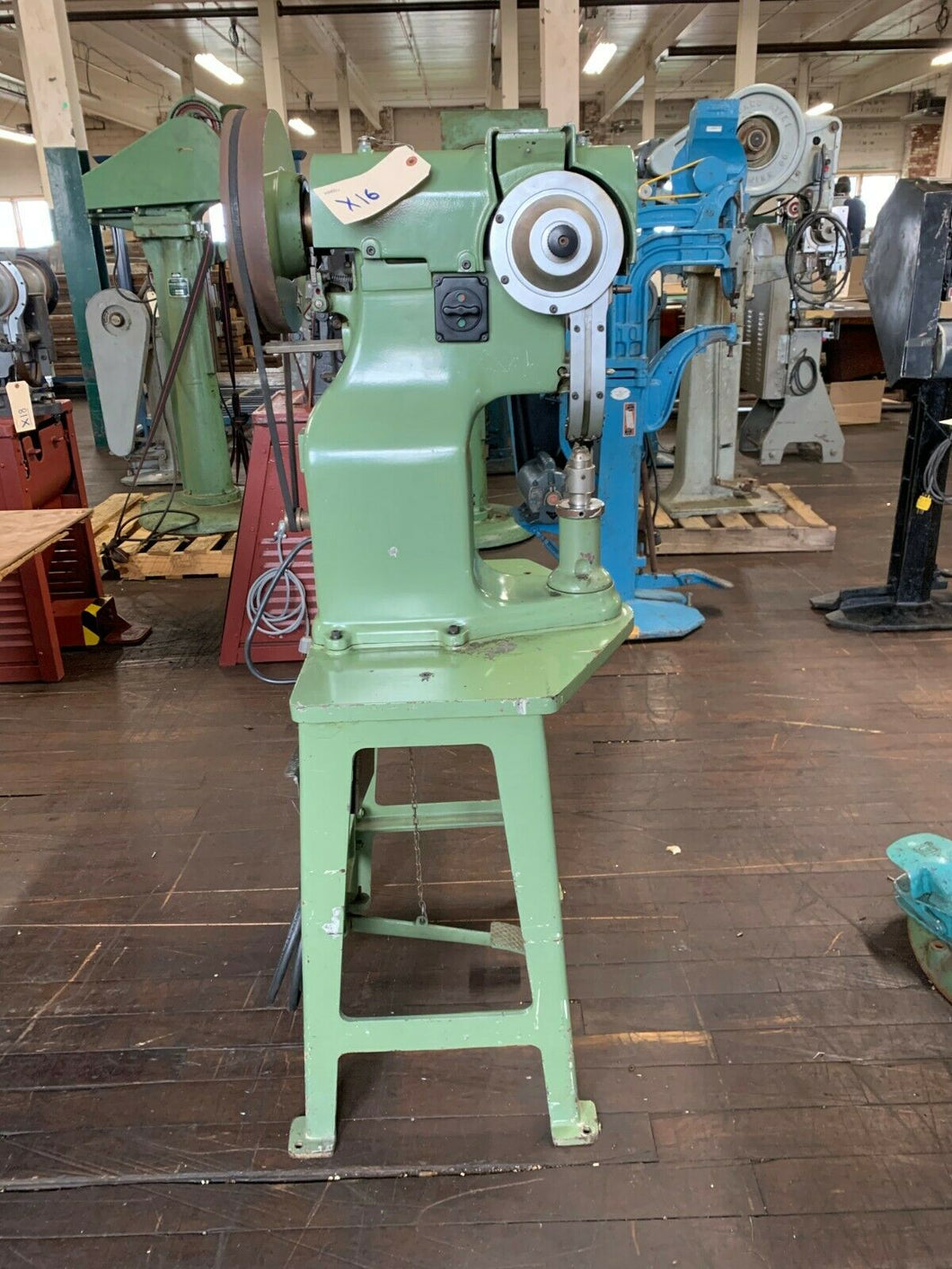 C.& C. Button & Trimming Co., Inc. - Pedal Operated Auto Feed Rivet Machine